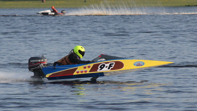 Dave Bennett racing APBA hydroplane with Speedcoat-49 fast boat coating on bottom of his hull.
